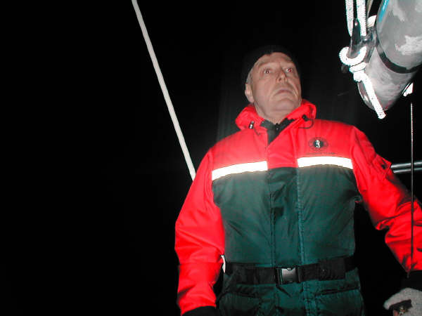 John-Looking-for-Logs-at-night