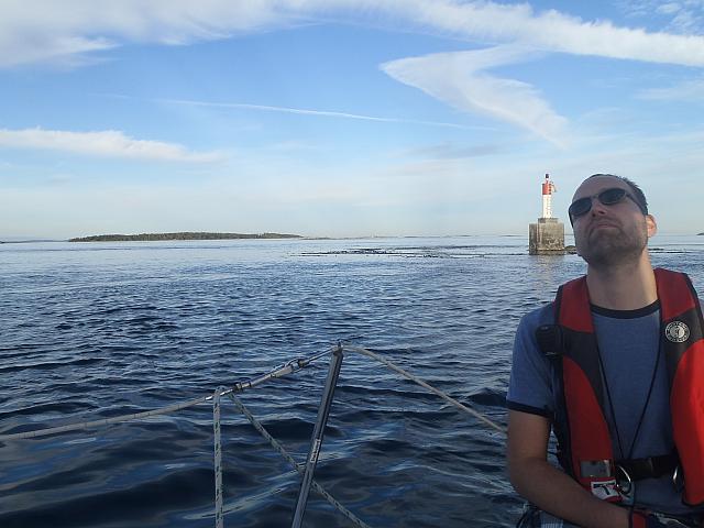 Don at the helm by light house