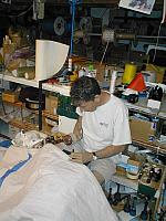 Dan-Pounding Grommets into sail