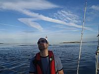 Don at the helm by light house... still