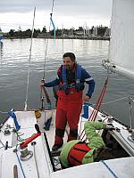 Roger is just starting to say YES as we hit the finish line in First place and winning the regatta.